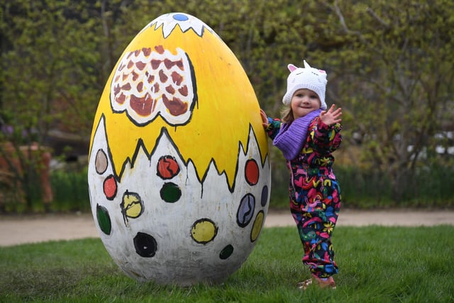 Two-year-old Lyra Wilson, from Bradford, with one of the giant eggs