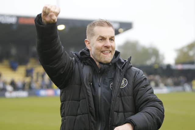 Sulphurites boss Simon Weaver celebrates survival after the full-time whistle.