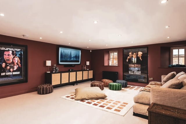 On the ground floor is a full size family room and cinema space.