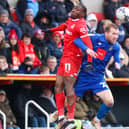 Stephen Dooley challenges for a header during Harrogate Town's 1-1 League Two draw at Swindon Town. Pictures: Matt Kirkham