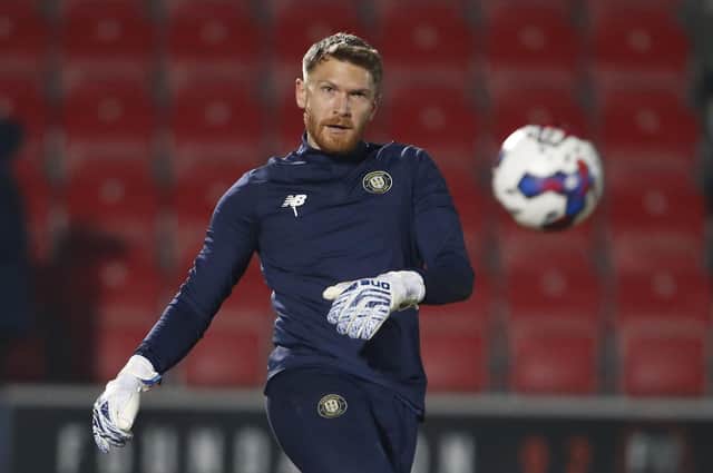 Mark Oxley warms up ahead of Harrogate Town's League Two clash at Salford City. Pictures: Paul Thompson/ProSportsImages