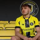 The new design of the Harrogate Town FC football shirt sees the return of a central vertical stipe, as worn in the club's National League North promotion season. (Picture contributed)
