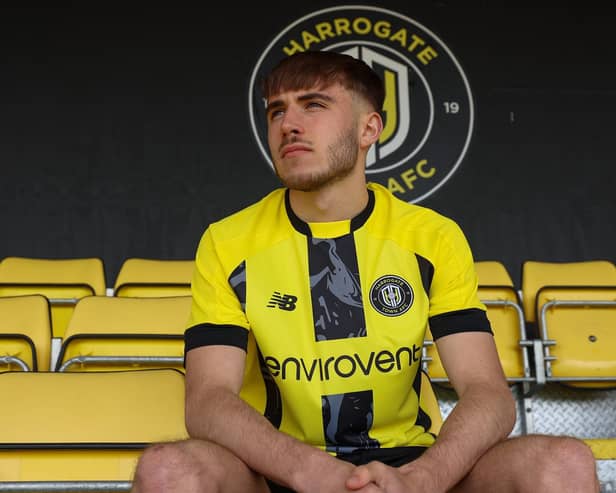 The new design of the Harrogate Town FC football shirt sees the return of a central vertical stipe, as worn in the club's National League North promotion season. (Picture contributed)