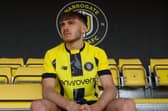 The new design of the Harrogate Town FC football shirt sees the return of a central vertical stipe, as worn in the club's National League North promotion season. (Picture contributed)