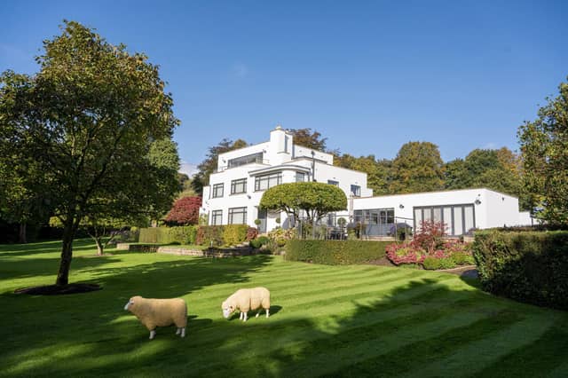 The stunning property sits within three acres of south-facing gardens and grounds.