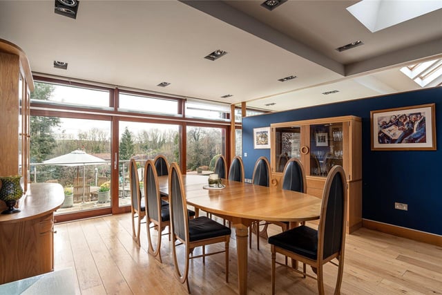 The spacious dining room has access to the outside terrace.