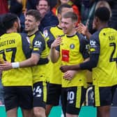 Harrogate Town players celebrate the Matty Daly goal which saw them come from behind to take the lead as they thrashed fellow play-off hopefuls Gillingham 5-1 at Wetherby Road on Easter Monday. Picture: Matt Kirkham