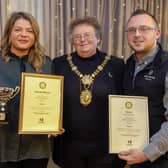 Harrogate Christmas Window Dressing Competition  winners - Pictured from left are Weetons shop manager Jessica Upson, Coun Victoria Oldham, and Weetons MD Rob Coutts.