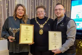 Harrogate Christmas Window Dressing Competition  winners - Pictured from left are Weetons shop manager Jessica Upson, Coun Victoria Oldham, and Weetons MD Rob Coutts.