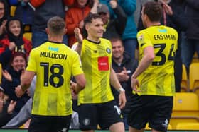Toby Sims celebrates after netting Harrogate Town's 74th-minute equaliser against Rochdale. Pictures: Matt Kirkham