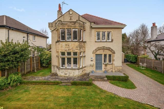 An attractive period home within enclosed gardens.