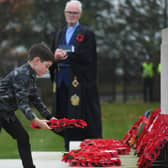 Seven-year-old Henry Dunn from Knaresborough lays a wreath at the Remembrance service at the Commonwealth War Graves Cemetery in Harrogate last year