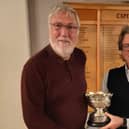 Pannal GC's 2022 Seniors Rosebowl winner Ian Webber, left, receiving his trophy from Men's Captain Lindsay Mckenzie. Picture: Submitted