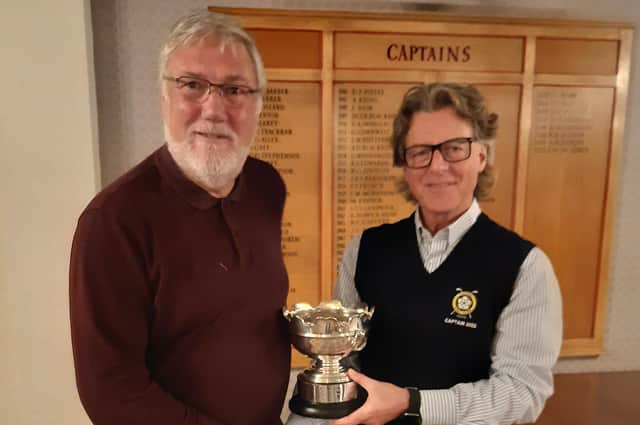 Pannal GC's 2022 Seniors Rosebowl winner Ian Webber, left, receiving his trophy from Men's Captain Lindsay Mckenzie. Picture: Submitted
