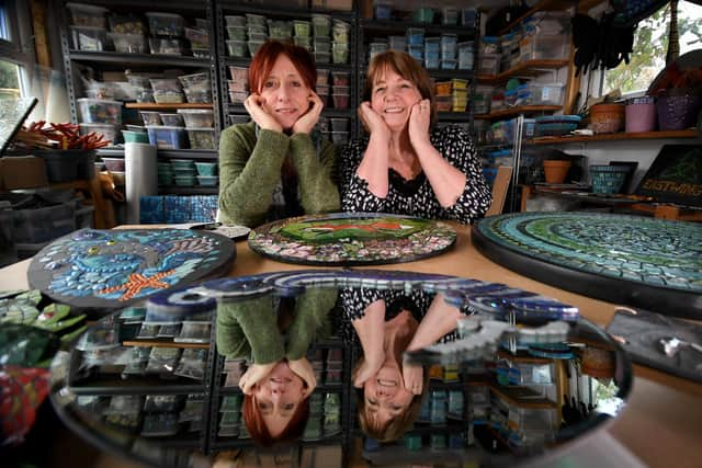 BAMM North mosaic artists Frances Taylor (left) and Flick Gillett with their work, at the Mosaic Mania studio in Otley. They are exhibiting their mosaics for home and garden at RHS Harlow Carr. Picture by Yorkshire Post photographer Simon Hulme.