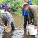 Volunteers from Yorkshire Dales Rivers Trust learning Riverfly monitoring to improve water quality in a Harrogate beck. (Picture YDRT)