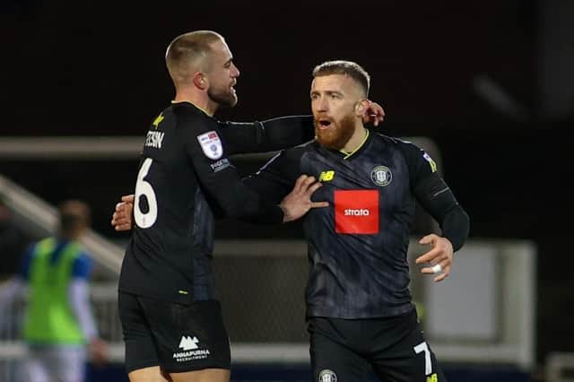 George Thomson, right, is congratulated by Harrogate Town team-mate Alex Pattison after netting his side's 73rd-minute equaliser during Sunday's 3-3 draw at Hartlepool United. Pictures: Matt Kirkham