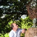 Orlando Compton with Raven Queen, one of the sculptures at the newly opened sculpture trail at Newby Hall