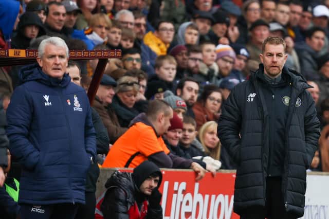 Bradford City manager Mark Hughes, left, and his Harrogate Town counterpart Simon Weaver watch on from the sidelines during Saturday's FA Cup first-round tie at Valley Parade. Pictures: Matt Kirkham