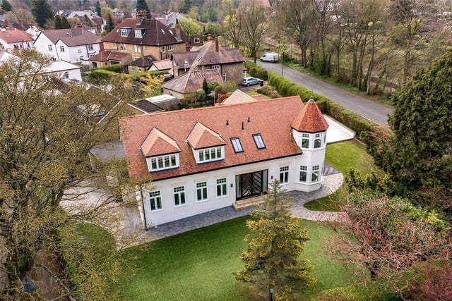 This five bedroom and five bathroom detached house is for sale with Fine & Country for £2,000,000