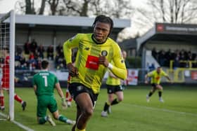 Sam Folarin begins his celebrations after firing Harrogate Town into an early lead against Walsall at the EnviroVent Stadium. Picture: Harrogate Town AFC