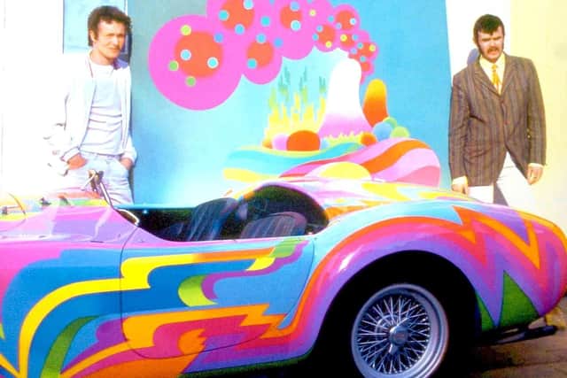 Swinging London - A young Dudley Edwards, left, and Doug Binder of pioneering Pop Art design collective BEV posing with the Cobra car they painted for The Beatles' friend Tara Browne in 1966. (Picture contributed)