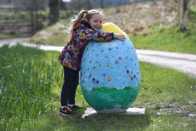Five-year-old Hallie Viveash, from Harrogate, with one of the giant eggs