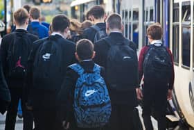 Youngsters community by rail.