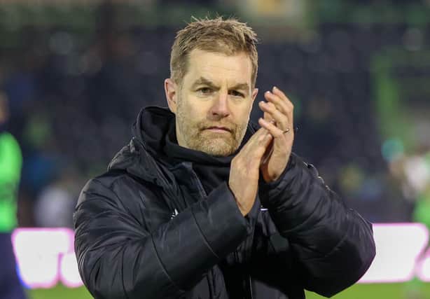 Harrogate Town Manager Simon Weaver applauds his team's travelling supporters. Picture: Matt Kirkham