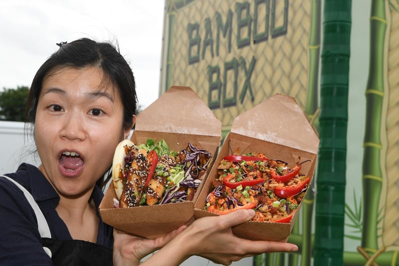 Phoebe Rob with a selection of Pan-Asian food on offer at the Bamboo Box stall at the festival