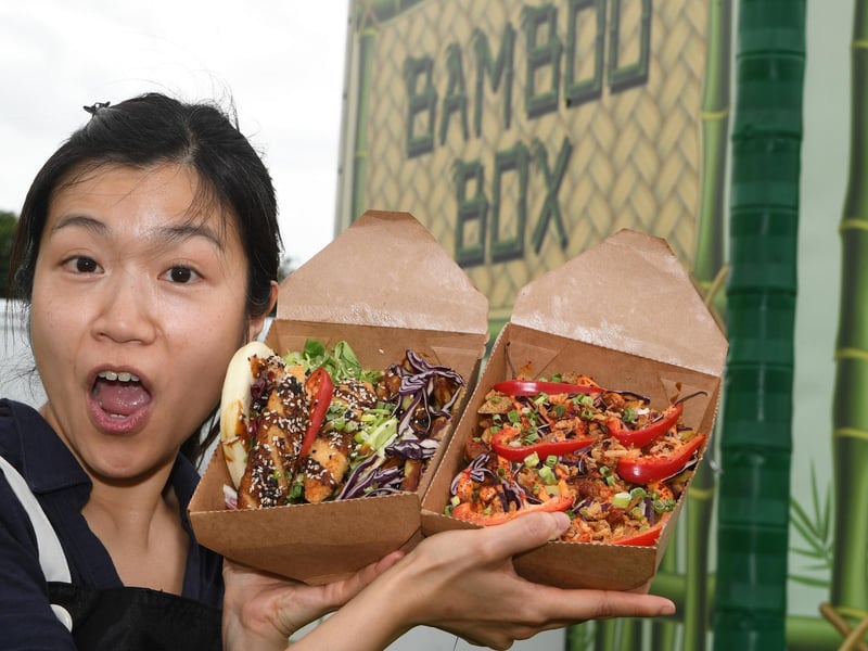 Phoebe Rob with a selection of Pan-Asian food on offer at the Bamboo Box stall at the festival