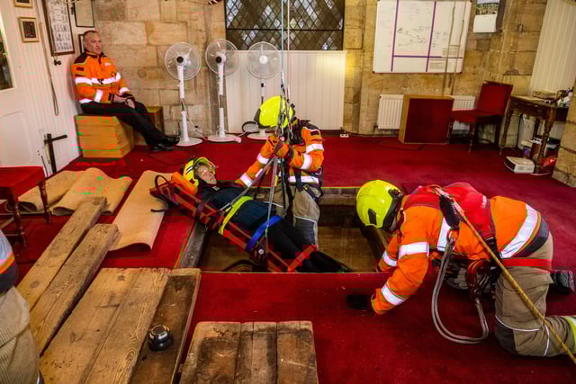 Verger Lucinda Taylor was strapped onto a stretcher and lowered 15 metres down to the cathedral floor from a trap door in the ringing room