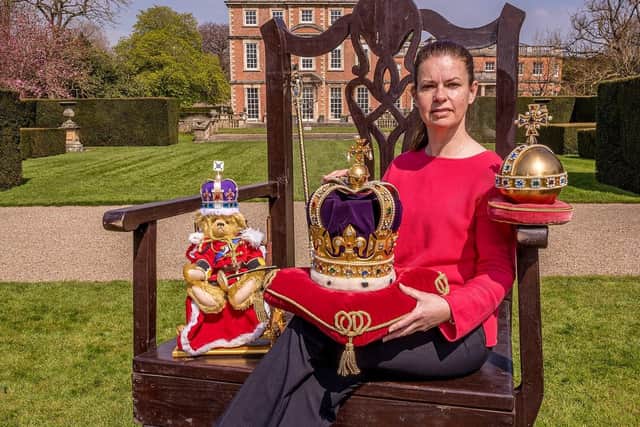 Newby Hall's Sarah Barlow with the replica Crown Jewels ready for the Coronation afternoon tea. (Picture Charlotte Graham).