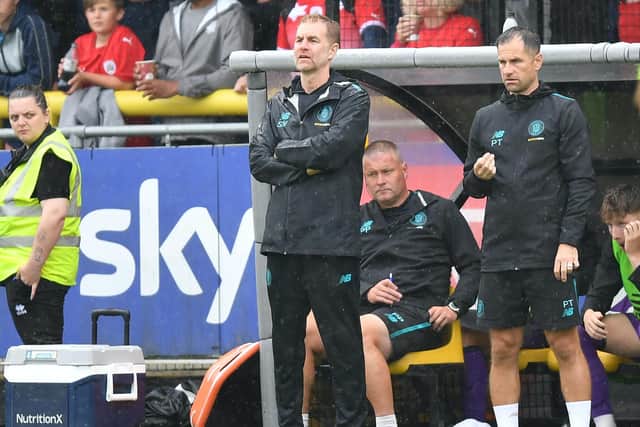 Simon Weaver watches on during Harrogate Town's 3-0 home defeat to Barnsley.