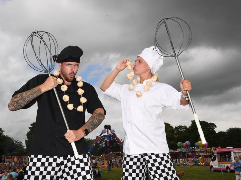 The stilt walkers keeping the crowds entertained at the festival