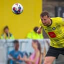 Tom Eastman in action during Harrogate Town's final-day-of-the-season draw with Rochdale at Wetherby Road. Pictures: Matt Kirkham