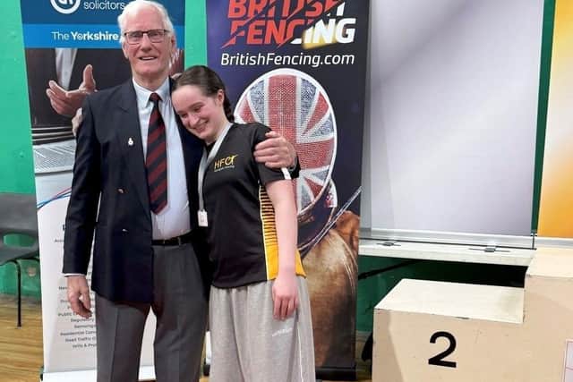 HFC President, Brian Matliss coach of Evelyn Coe who at only 15 years of age placed 2nd in the Women's epee event.