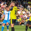 Harrogate Town striker Jack Muldoon holds his head in his hands after failing to convert a 61st-minute penalty during Saturday's 1-0 home defeat to Barrow. Pictures: Matt Kirkham