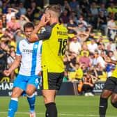 Harrogate Town striker Jack Muldoon holds his head in his hands after failing to convert a 61st-minute penalty during Saturday's 1-0 home defeat to Barrow. Pictures: Matt Kirkham