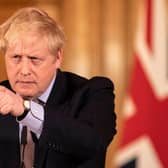 Prime Minister Boris Johnson gives a press conference on the ongoing situation with the coronavirus pandemic with chief medical officer Chris Whitty and Chief scientific officer Sir Patrick Vallance in Downing Street after he had taken part in the government's COBRA meeting on March 16 (Photo: Richard Pohle - WPA Pool/Getty Images)