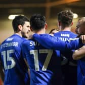 Harrogate Town's players celebrate taking a 2-0 lead during Tuesday night's League Two clash with Doncaster Rovers. Pictures: Matt Kirkham