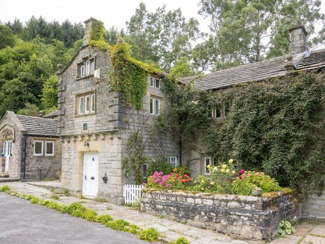 The estate's exterior is just as enchanting as its interior with one of a kind stone architecture
