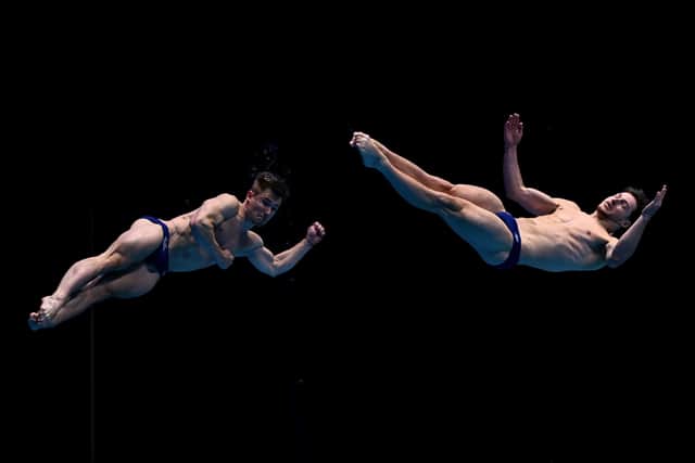 Jack Laugher, left, and Anthony Harding of Team Great Britain compete in the Men's Synchronized 3m Springboard Preliminaries on day two of the Fukuoka 2023 World Aquatics Championships. Picture: Quinn Rooney/Getty Images