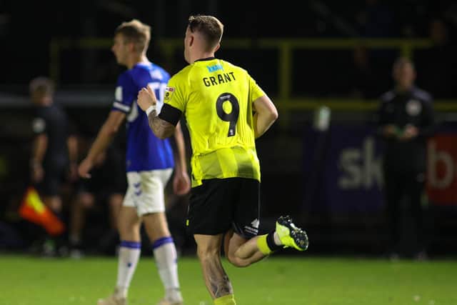 Danny Grant celebrates after netting Harrogate Town's 72nd-minute equaliser against Everton U21s.