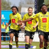 Kazeem Olaigbe celebrates after firing Harrogate Town into an early lead at Northampton Town. Picture: Matt Kirkham