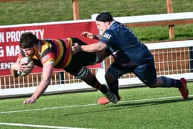 Harrogate RUFC captain Sam Brady dives over the try-line during Good Friday's emphatic victory over Doncaster Phoenix. Picture: Daniel Kerr