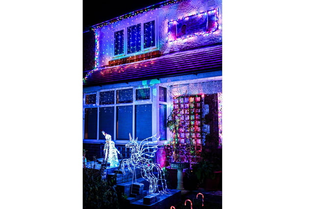 This home made full use of the festive spirit and decided to display their new business in lights, on the centre of the building.