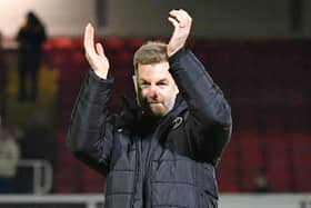 Simon Weaver applauds Harrogate Town's travelling supporters following Tuesday night's 3-2 success at Newport County. Pictures: Harrogate Town AFC
