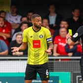 Harrogate Town's Warren Burrell is shown a yellow card during his side's 3-0 win over Swindon Town on the opening day of the 2022/23 season. Picture: Matt Kirkham