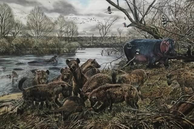 Popular part of festival - A painting by James McKay of 125 million years ago when prehistoric animals roamed Knaresborough. (Picture contributed)